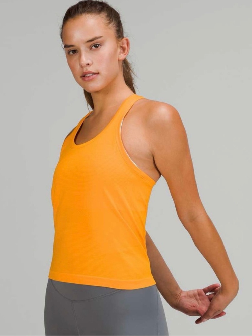Lululemon Swiftly Tech racer back size 4 Clementine cropped